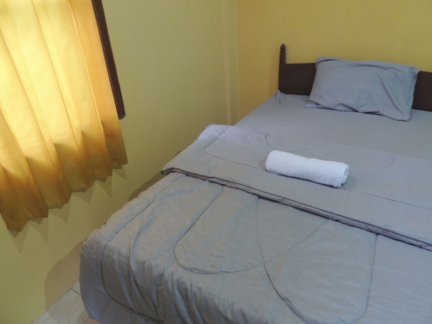 Imagen de la habitación del Casa de Huéspedes Penginapan Wardi Syariah Borobudur by Ndalem Beong. Foto 8