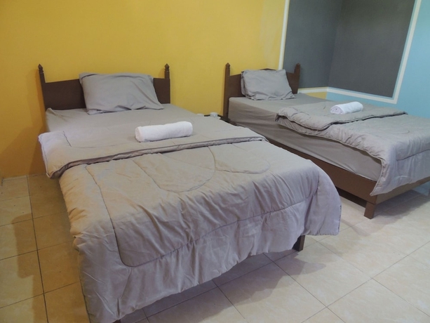 Imagen de la habitación del Casa de Huéspedes Penginapan Wardi Syariah Borobudur by Ndalem Beong. Foto 12