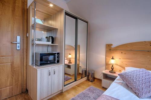 Imagen de la habitación del Casa de Huéspedes Pensjonat Dawidek. Foto 15