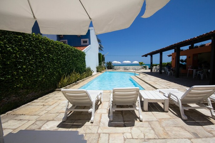 Imagen de la piscina del Casa de Huéspedes Pousada Ba&iacute;a Dos Corais, Tamandar&eacute;. Foto 23