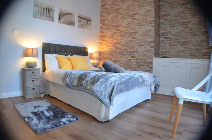 Imagen de la habitación del Casa de Huéspedes Queens Guesthouse Manchester. Foto 7