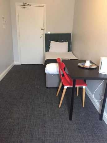 Imagen de la habitación del Casa de Huéspedes Queens Guesthouse Manchester. Foto 10