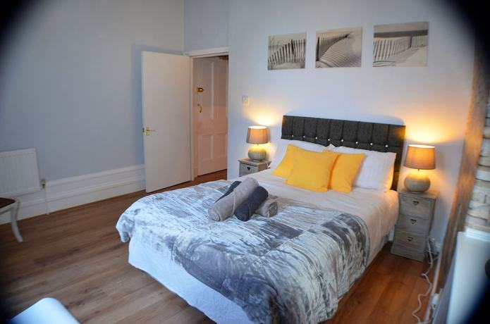 Imagen de la habitación del Casa de Huéspedes Queens Guesthouse Manchester. Foto 11