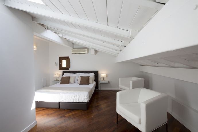 Imagen de la habitación del Casa de Huéspedes Relais Arco Della Pace. Foto 7