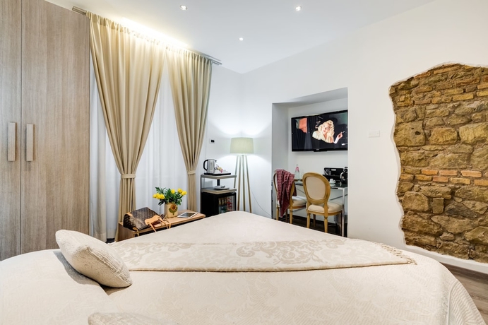 Imagen de la habitación del Casa de Huéspedes Relais Colonna 27. Foto 17