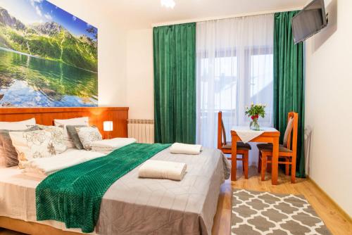 Imagen de la habitación del Casa de Huéspedes Rodzinny Dom Wypoczynkowy u Ciwersa. Foto 12
