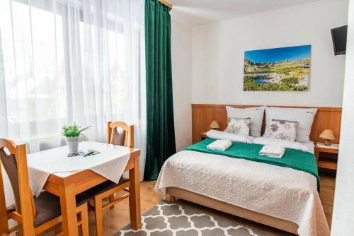 Imagen de la habitación del Casa de Huéspedes Rodzinny Dom Wypoczynkowy u Ciwersa. Foto 15