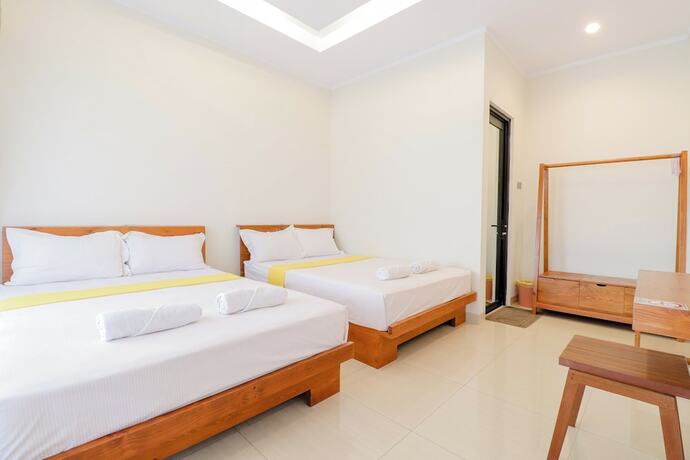 Imagen de la habitación del Casa de Huéspedes Roemah Kenari. Foto 15