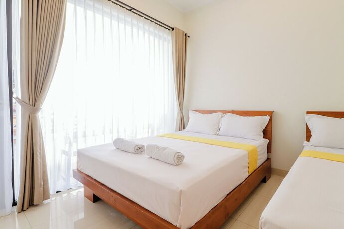 Imagen de la habitación del Casa de Huéspedes Roemah Kenari. Foto 16
