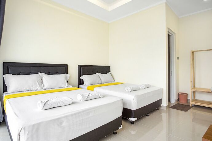 Imagen de la habitación del Casa de Huéspedes Roemah Kenari. Foto 17