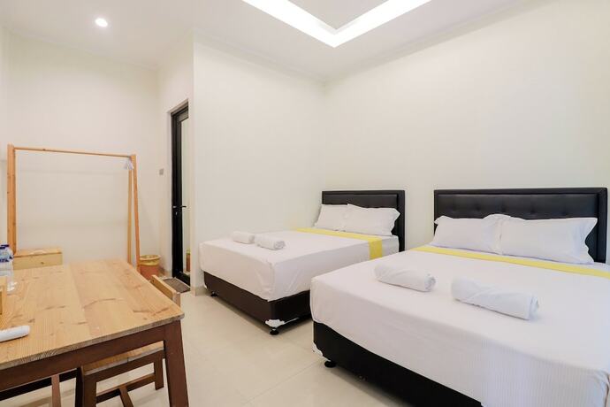 Imagen de la habitación del Casa de Huéspedes Roemah Kenari. Foto 18