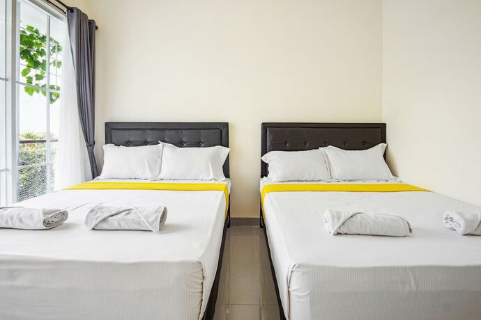 Imagen de la habitación del Casa de Huéspedes Roemah Kenari. Foto 20