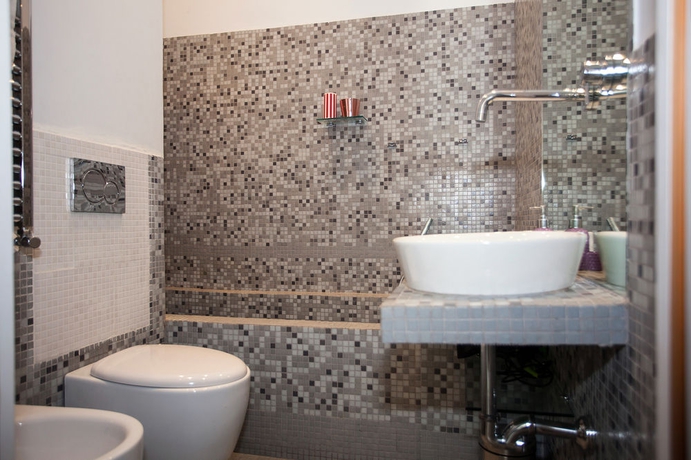 Imagen de la habitación del Casa de Huéspedes Royal Suite Du Vatican. Foto 11