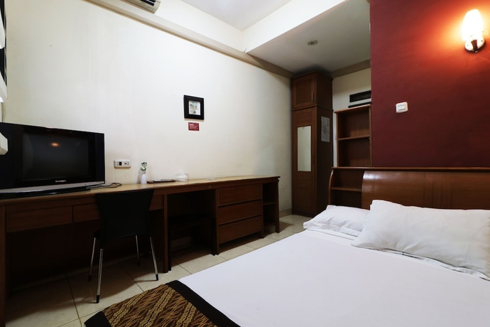 Imagen de la habitación del Casa de Huéspedes Rumah Tawa Guesthouse 1. Foto 6