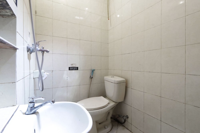 Imagen de la habitación del Casa de Huéspedes Rumah Tawa Guesthouse 1. Foto 9