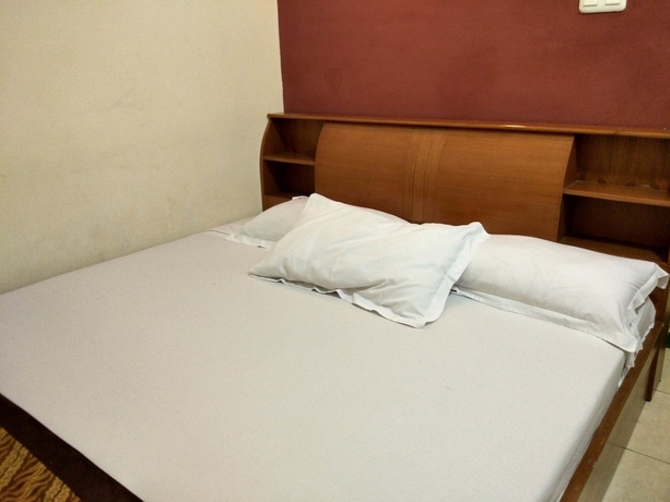 Imagen de la habitación del Casa de Huéspedes Rumah Tawa Guesthouse 1. Foto 12