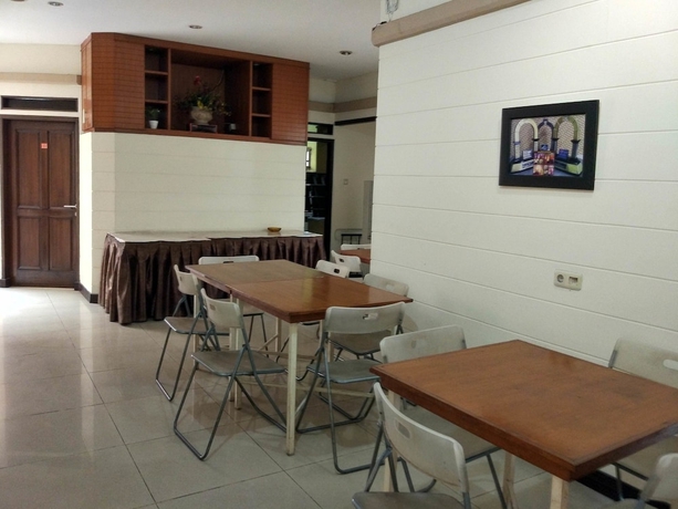 Imagen del bar/restaurante del Casa de Huéspedes Rumah Tawa Guesthouse 1. Foto 3