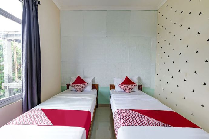 Imagen de la habitación del Casa de Huéspedes SUPER OYO 90905 Dangau Datuk Guesthouse, Pelem. Foto 10