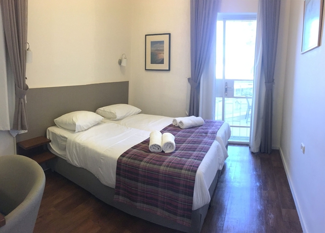 Imagen de la habitación del Casa de Huéspedes Scots House Hotel. Foto 2