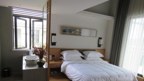 Imagen general del Casa de Huéspedes Shanshui Mingyuan. Foto 2