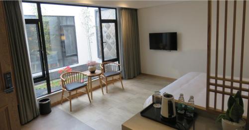 Imagen general del Casa de Huéspedes Shanshui Mingyuan. Foto 8