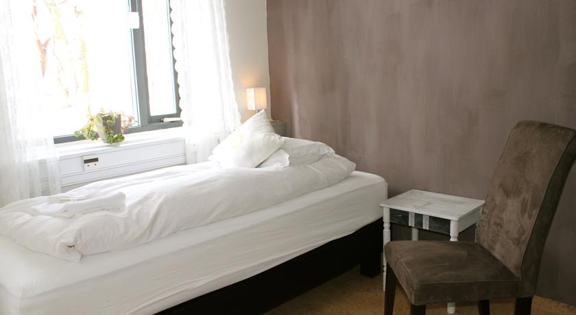 Imagen de la habitación del Casa de Huéspedes Skjaldarvik Guest House. Foto 2