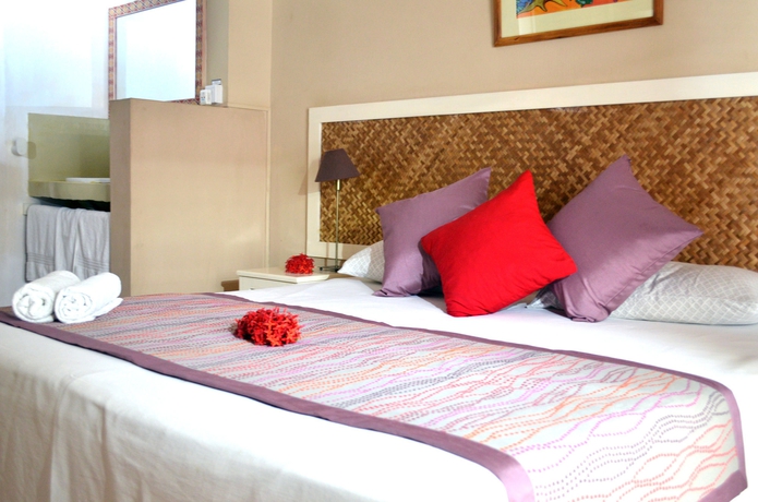 Imagen de la habitación del Casa de Huéspedes Sous Le Badamier. Foto 8