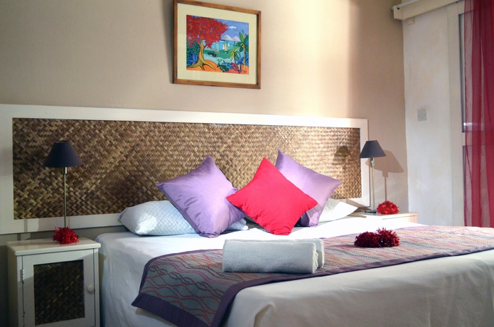 Imagen de la habitación del Casa de Huéspedes Sous Le Badamier. Foto 10