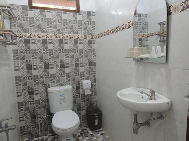 Imagen de la habitación del Casa de Huéspedes Srikayah Syariah by Ndalem Beong. Foto 2