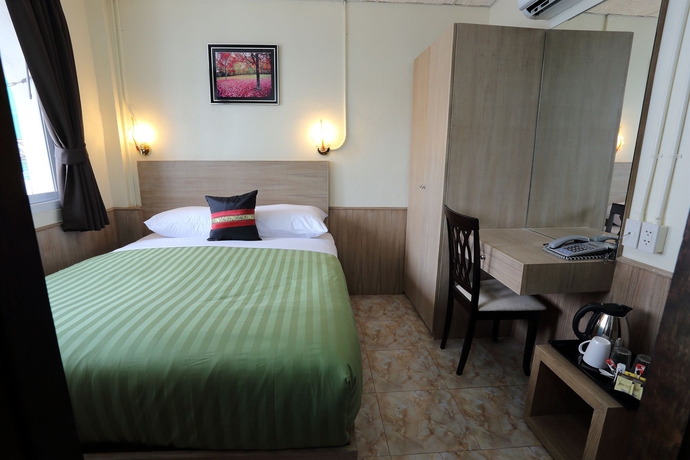 Imagen de la habitación del Casa de Huéspedes Sukhumvit 20 Guest House. Foto 10