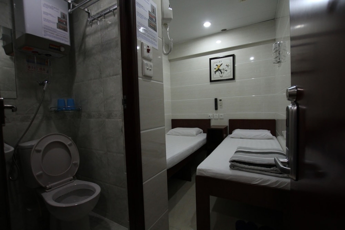 Imagen de la habitación del Casa de Huéspedes Tai Wah Guest House. Foto 4