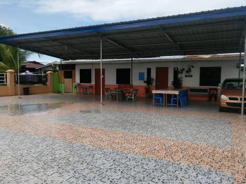 Imagen de la habitación del Casa de Huéspedes Taun Gusi Village Homestay. Foto 5