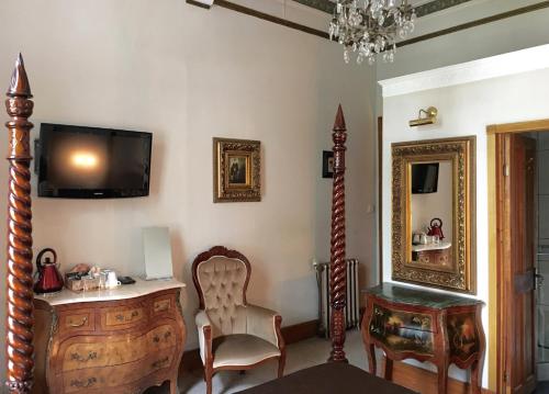 Imagen de la habitación del Casa de Huéspedes The Alamo Guest House. Foto 1