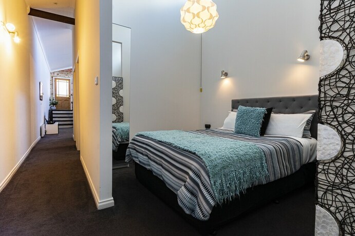 Imagen de la habitación del Casa de Huéspedes The Albert and Mills Guest House and Apartments. Foto 10