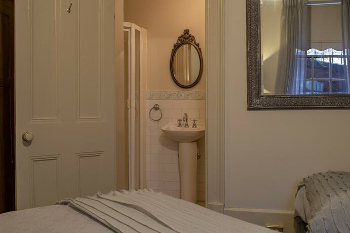 Imagen de la habitación del Casa de Huéspedes The Albert and Mills Guest House and Apartments. Foto 17