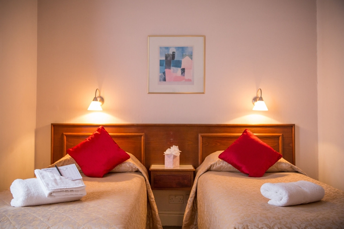 Imagen de la habitación del Casa de Huéspedes The Washington. Foto 7