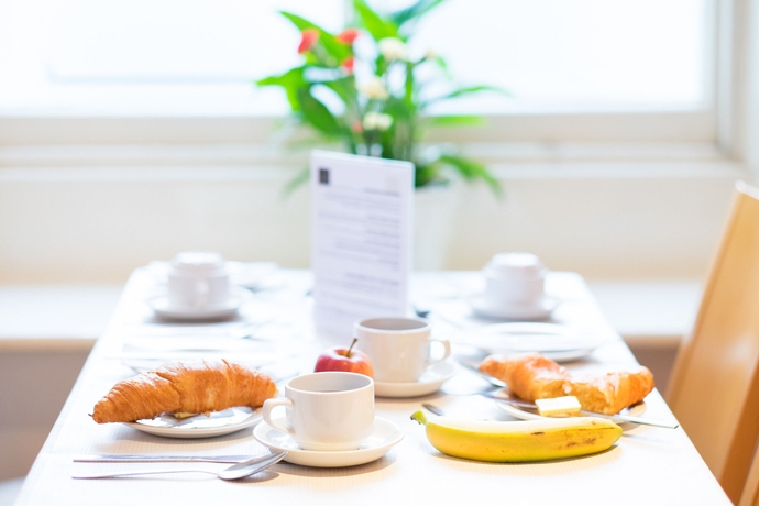 Imagen del bar/restaurante del Casa de Huéspedes The Washington. Foto 5