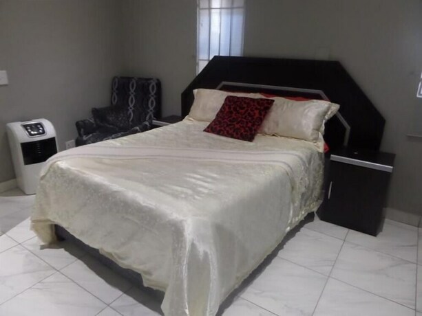 Imagen de la habitación del Casa de Huéspedes Tshedza. Foto 19