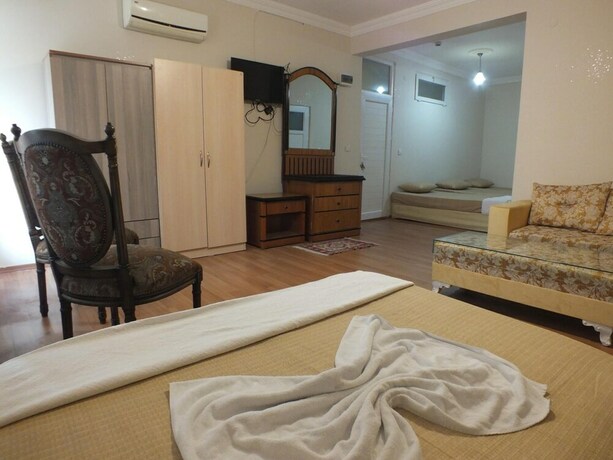 Imagen de la habitación del Casa de Huéspedes Uyar Palace. Foto 15