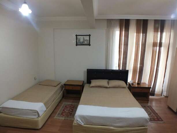 Imagen de la habitación del Casa de Huéspedes Uyar Palace. Foto 20