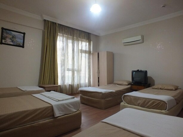 Imagen de la habitación del Casa de Huéspedes Uyar Palace. Foto 22