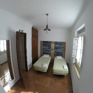 Imagen de la habitación del Casa de Huéspedes Villa Ana Margarida Residence. Foto 20