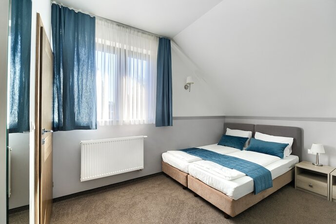 Imagen de la habitación del Casa de Huéspedes Villa Madre Golf and Family. Foto 20