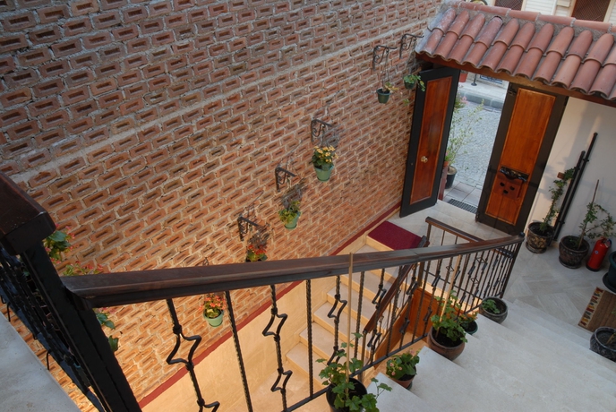 Imagen de los interiores del Casa de Huéspedes Villa Sphendone Suites. Foto 14