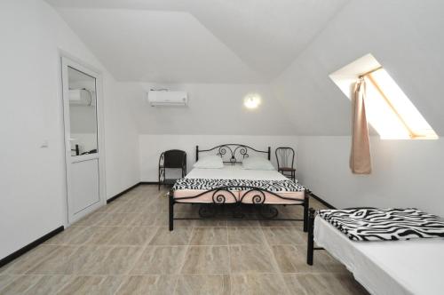 Imagen de la habitación del Casa de Huéspedes Villa U Morya. Foto 8