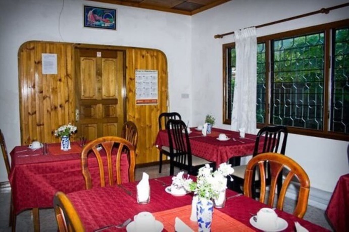 Imagen del bar/restaurante del Casa de Huéspedes Villa de Roses. Foto 3