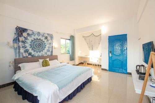 Imagen de la habitación del Casa de Huéspedes Weizhou Yalan. Foto 7