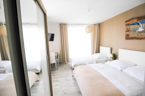 Imagen de la habitación del Casa de Huéspedes Willa Baltycka Bryza. Foto 11