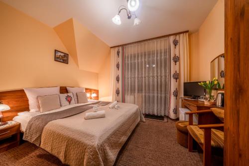 Imagen de la habitación del Casa de Huéspedes Willa u Zwijaczy. Foto 3