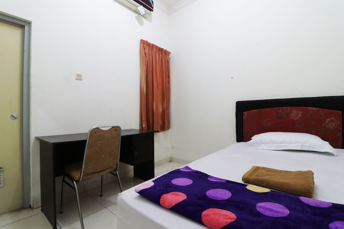 Imagen de la habitación del Casa de Huéspedes Wisma Lamida 2 Syariah. Foto 2
